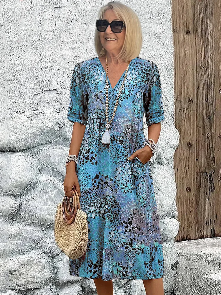 Anthea | Elegantní květinové midi šaty